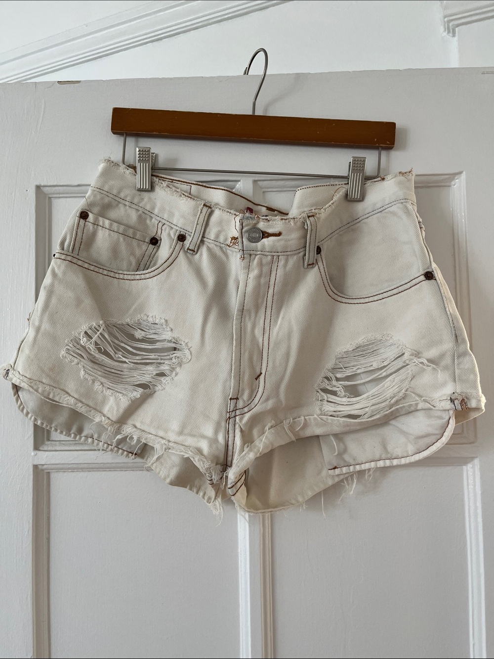 Levi's Off-White Distressed Denim Cutoff Shorts